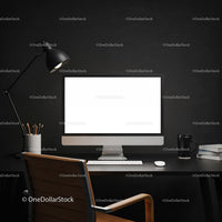 Modern workspace with sleek computer and desk lamp