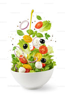 Fresh Mediterranean Salad Ingredients Flying in Bowl
