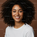 Joyful Woman with Curly Hair and Freckles in Casual White T-shirt