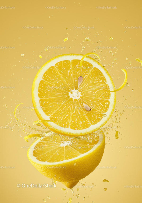 Fresh lemon halves bursting with juice and zest