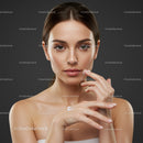 Young Woman Applying Lotion for Healthy Skin Against Dark Background