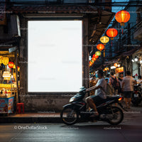 Evening street scene with motorbike and colorful lanterns
