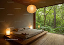 Minimalist bedroom with forest view through large window