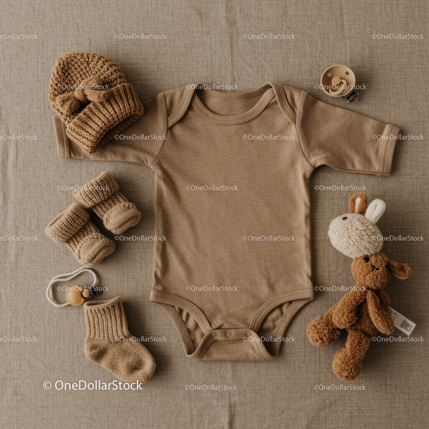 Neutral toned baby essentials with cozy knitted accessories