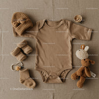 Neutral toned baby essentials with cozy knitted accessories
