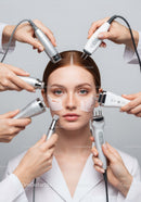 Professional Facial Treatment Using Multiple Skincare Devices with Young Woman