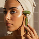 Close-up of a Woman Using Jade Roller for Facial Skin Care