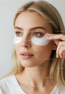 Young Woman Applying Under Eye Patches for Skin Rejuvenation