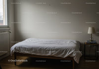 Minimalist Bedroom with White Bed and Contemporary Nightstand