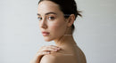 Elegant Portrait of a Young Woman with Flawless Skin and Confident Expression