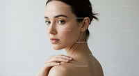 Elegant Portrait of a Young Woman with Flawless Skin and Confident Expression