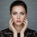 Gorgeous Woman with Bright Blue Eyes and Flawless Skin