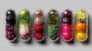 Vibrant Assorted Fresh Berries and Vegetables in Capsules