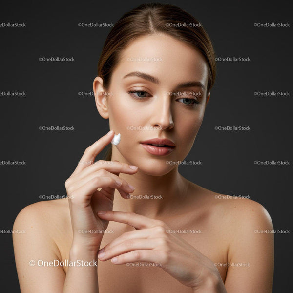 Young Woman Applying Facial Cream for Skincare Routine