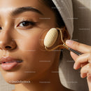 Young woman receiving facial massage with roller for skincare and relaxation