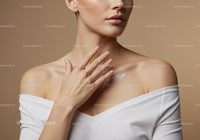 Elegant Woman Applying Moisturizer on Shoulder for Healthy Skin
