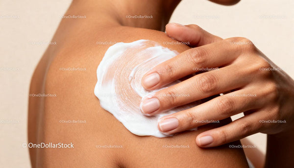 Applying Moisturizing Cream to Smooth Shoulder Skin
