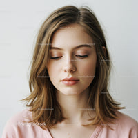 Elegant Portrait of a Young Woman with Blonde Hair and Soft Makeup