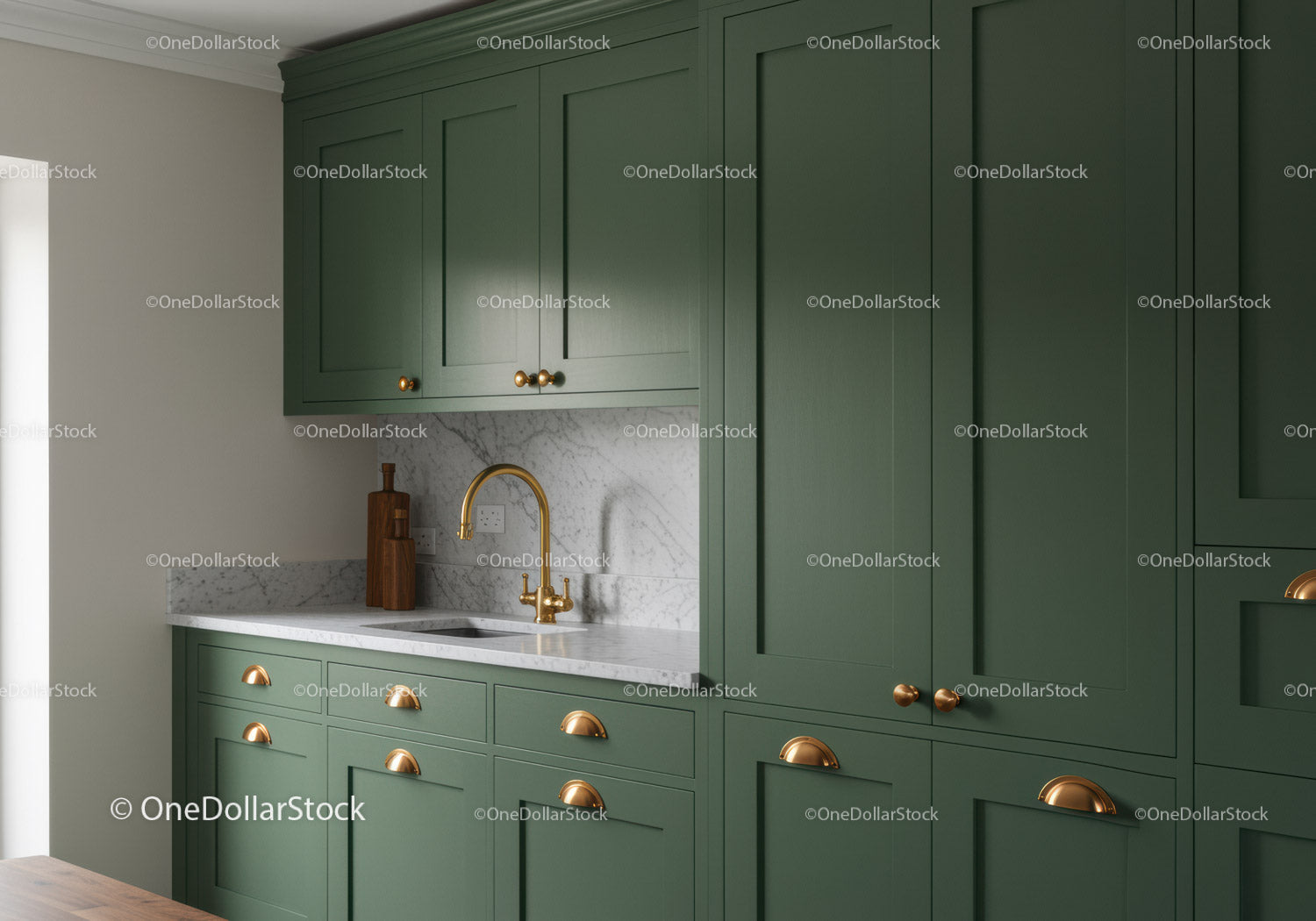 Elegant Green Kitchen with Marble Countertop and Gold Handles