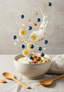Fresh yogurt bowl with fruits nuts and chia seeds splash