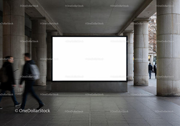 Blank white billboard in urban stone column walkway JPG Mockup Image
