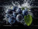 Fresh Blueberries with Water Splash and Green Leaf in Dark Background
