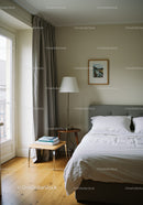 Cozy Bedroom with Bedside Lamp and Natural Light from Window