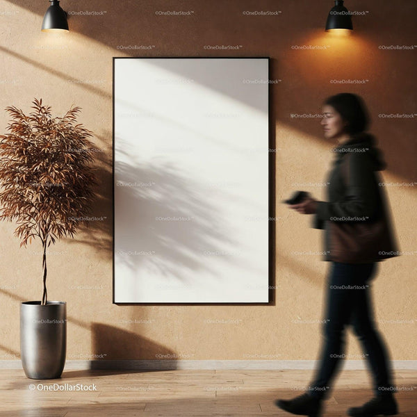 Blurred woman walking past blank wall poster with plant JPG Mockup Image
