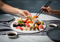 Assorted Sushi Platter with Nigiri and Rolls on White Plate