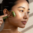 Young Woman Using Jade Roller for Skin Rejuvenation and Facial Relaxation