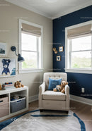 Modern Baby Nursery Room with Cozy Armchair and Children's Decor