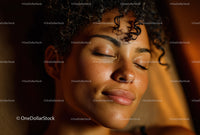 Beautiful Woman with Curly Hair in Soft Natural Light