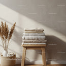 Neatly Folded Towels in Warm Minimalist Interior