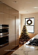 Cozy kitchen corner with lit Christmas tree and gifts