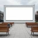 Empty Outdoor Seating Area Facing Large Blank Screen