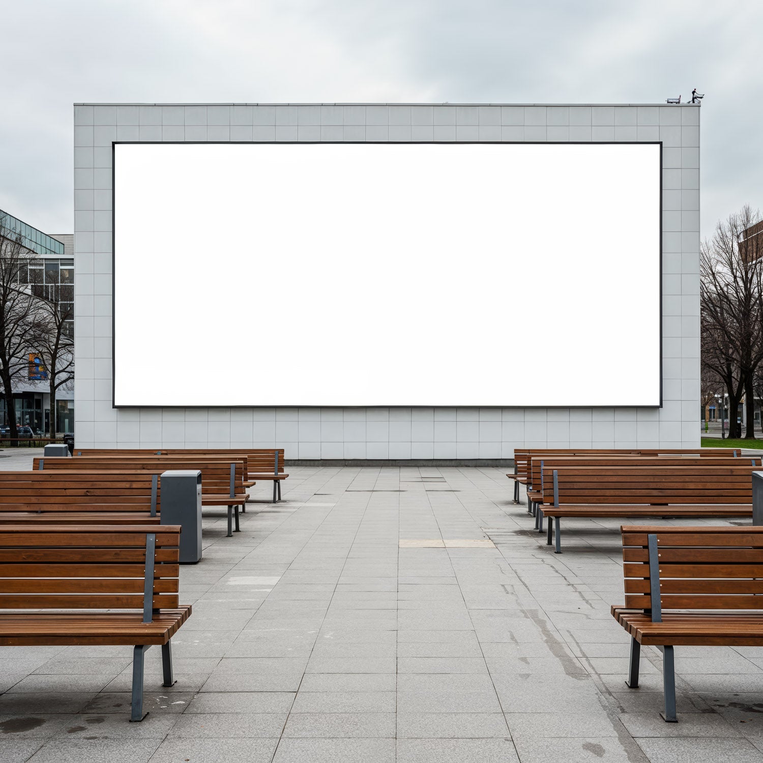 Empty Outdoor Seating Area Facing Large Blank Screen
