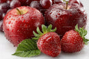 Fresh Ripe Strawberries with Dew Drops and Green Leaves