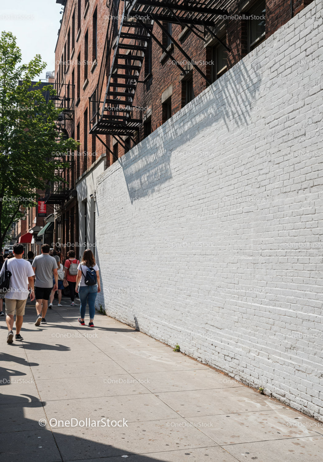 City Street with Pedestrians and Brick Building Fire Escape