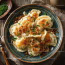 Crispy Potstickers with Caramelized Onions Garnished with Herbs
