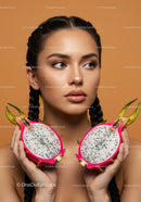 Elegant Woman with Halved Dragon Fruits Creative Tropical Concept