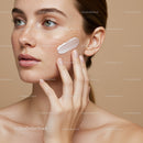 Close-up of a Woman Applying Moisturizer for Glowing Skin
