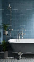 Modern clawfoot bathtub with blue tiled walls
