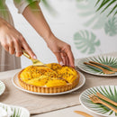 Passion Fruit Tart with Fresh Mango Slices and Passion Fruit Seeds