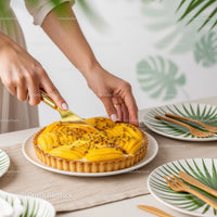 Passion Fruit Tart with Fresh Mango Slices and Passion Fruit Seeds