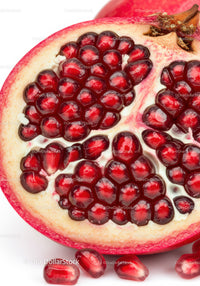 Close-up of fresh pomegranate with juicy seeds