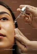 Professional Facial Treatment with Serum Application for Healthy Skin