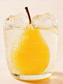 Pear immersed in sparkling water with ice cubes