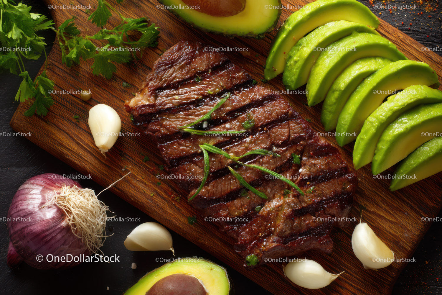 Grilled Steak with Avocado and Fresh Herbs on Wooden Cutting Board