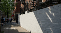Urban Sidewalk Scene with Pedestrians and City Architecture