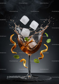 Refreshing cocktail with ice and citrus peel splash